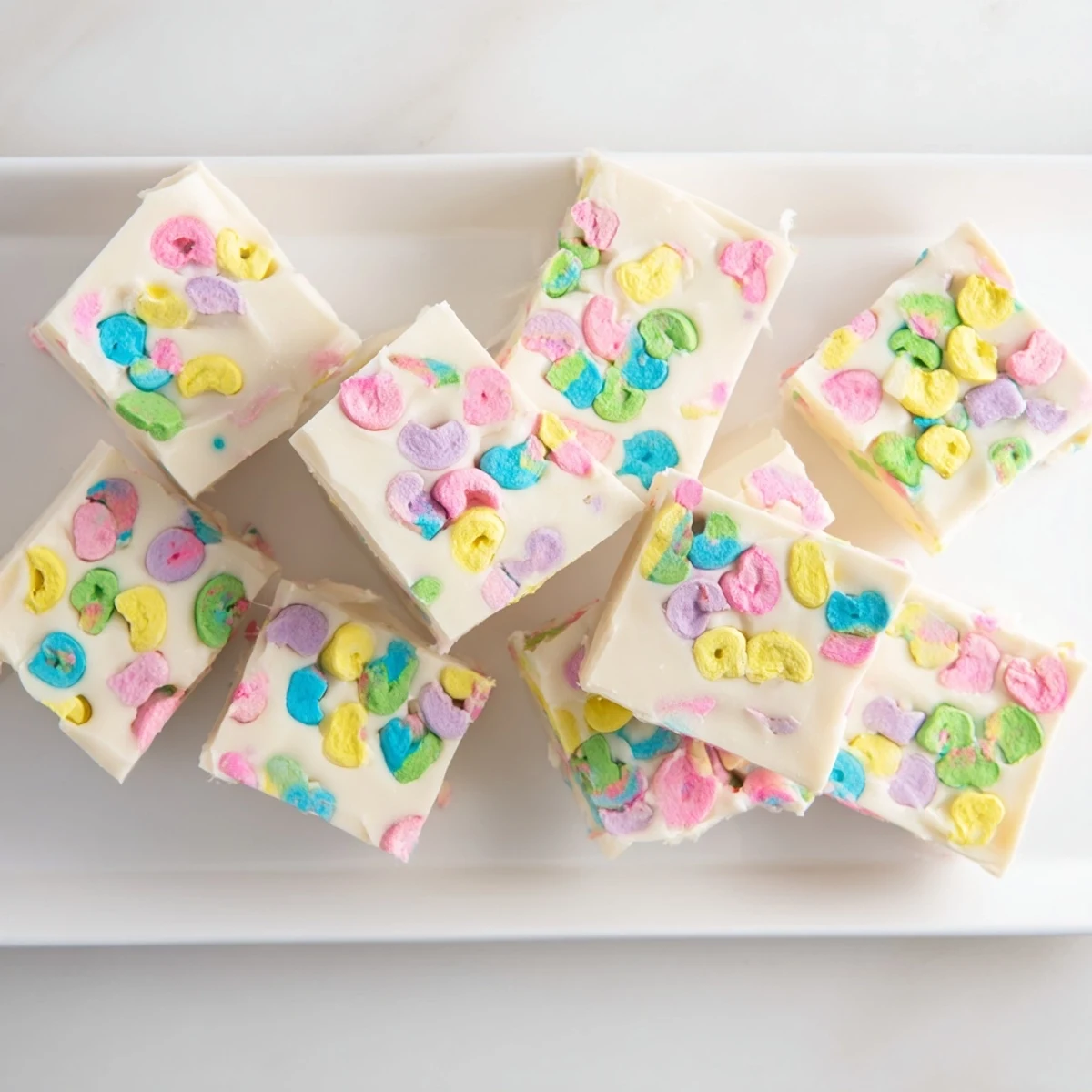 Homemade Easy Lucky Charms Fudge with vibrant rainbow marshmallows ready for party serving