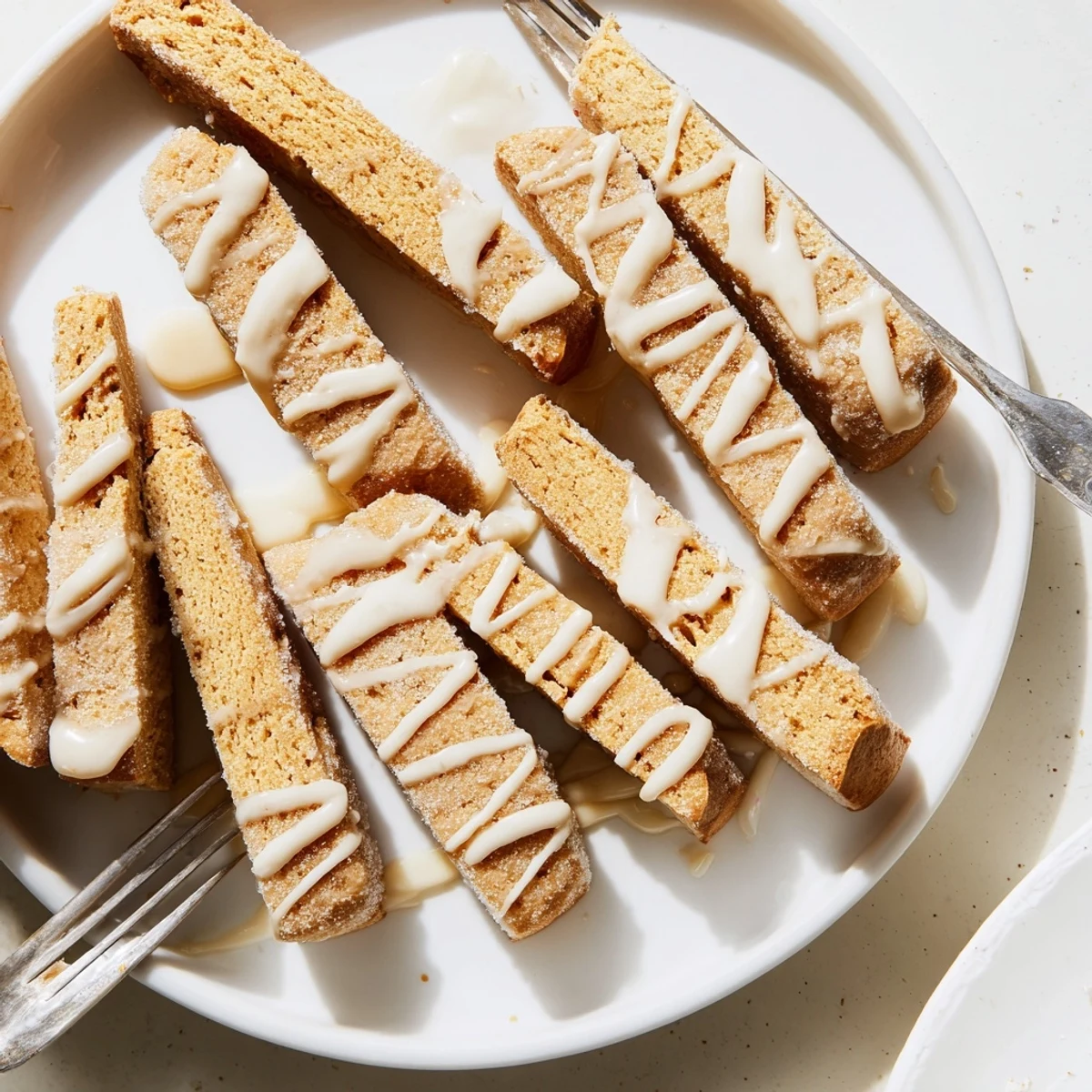 Buttery sugar cookie biscotti sprinkled with coarse sparkling sugar arranged for holiday gifting