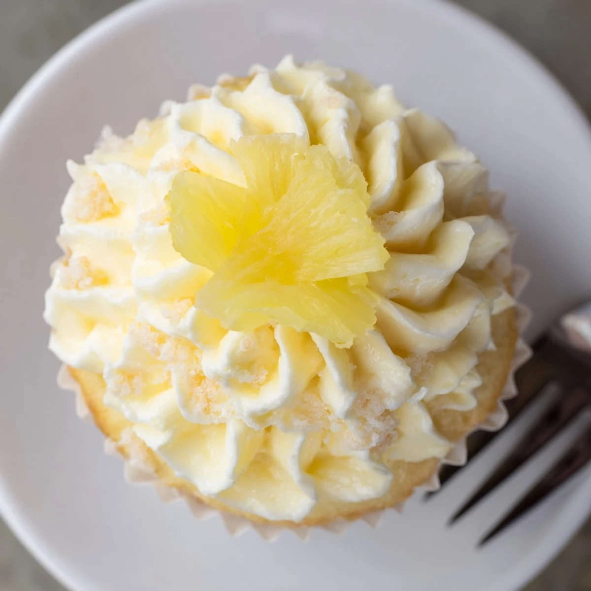 Dole Whip Cupcakes Recipe with fluffy pineapple cake and silky cream cheese frosting
